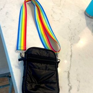 I’m selling a phone bag that is black and the straps are rainbow